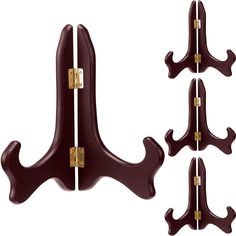 three pieces of wooden coat hooks with brass hardware on each side and one piece in the middle