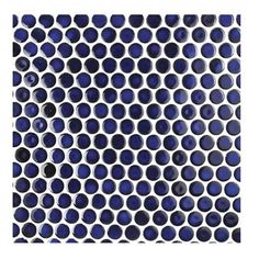 a blue and white mosaic tile pattern with circles on it's surface, as well as the bottom half