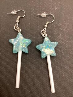 Hungry for some ear candy? These glittery baby blue star pops are made of acrylic charms and stainless steel findings and fish hook ear wire. Satisfy your sweet tooth with these earrings! Fun Earrings Studs, Clown Earrings, Rainbow Clothes, Blue Stuff, Cape Girardeau, Cool Earrings, Earrings Star, Rainbow Outfit, Funky Earrings