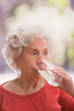 Senior Chilean Woman Drinking Water Foto de stock 136802169 Drinking Water Reference, Person Drinking Water, Woman Pouring Water, Good Morning Tea, Elderly People, Water Images, Water Photography, Break Dance, Old People