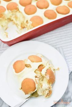 a white plate topped with a piece of cake next to a muffin tin filled with cupcakes