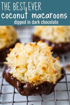 the best ever coconut macaroons dipped in dark chocolate on a cooling rack