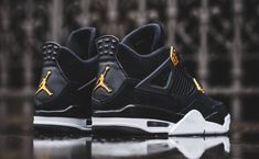 The Air Jordan 4 Retro ‘Royalty’ pairs a monochromatic black suede upper with contrasting metallic gold accents. They shine on the signature molded eyelets and a Jumpman icon on the synthetic leather heel panel. Additional Jumpman branding lands on the woven tongue tag and rubber outsole . featuring a traditional herringbone traction pattern for optimal [...] Air Jordan 1 Dior, Jordan 1 Dior, Air Jordan 1 Chicago, Royalty Design, Jordan 1 Blue, Blue Chill, Jordan 1 Black, Buy Jordans, Jordan Shoes Retro