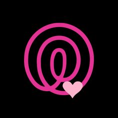 the letter q with a pink heart in it's center on a black background