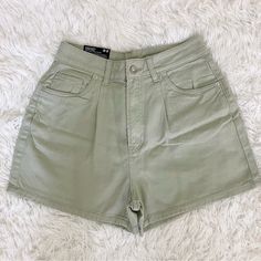 Nwt Divided By H&M High Waist Mom Shorts Sage Green Denim Size 6 Waist Measures 13” Across Top Rise Measures 12” Inseam Measures 3” Smoke Free Home High Waist Khaki Cotton Shorts, Khaki High Waist Cotton Shorts, H&m Casual Shorts For Spring, Khaki Cotton High Waist Shorts, H&m Casual Spring Shorts, Casual Khaki Jean Shorts, Casual Cotton Bottoms From H&m, High Rise Green Denim Shorts, Trendy H&m Bottoms For Spring