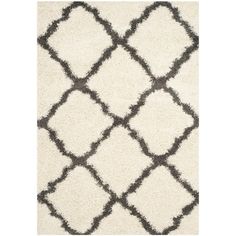 a black and white area rug with an interesting design on the top, it looks like something out of nowhere