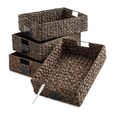 three woven baskets with handles on each side