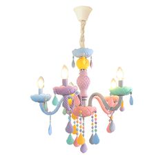 a colorful chandelier hanging from the ceiling with beads and lights attached to it