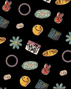 an assortment of stickers on a black background with words and smiley faces in different languages