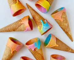 ice cream cones with colorful swirls are on the instagram page for new year's eve