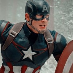 captain america is standing in front of the camera