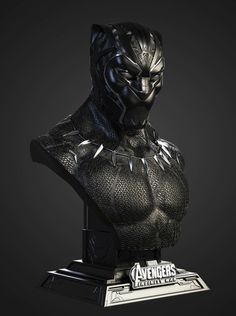 the avengers statue is shown in black and silver colors, with an iron man busturine