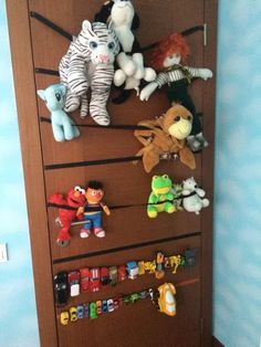 there are many stuffed animals hanging on the closet door and it's time to put them together