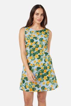 Floral printed mini shift dress featuring gorgeous hand painted nasturtium flowers. This sleeveless style is made of cotton- fitted bodice into a line shaped skirt - sleeveless style - side ties for a more cinched look - invisible back zipper - made of a smooth cotton- available in blue Product Code: PGFY180 Nasturtium Flowers, Princess Highway, Picnic Dress, Baby Outerwear, Dress Princess, Dress 16, Colorblock Dress, Mini Shift Dress, Smock Dress