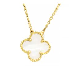 This Van Cleef & Arpels 18k Gold Vintage Alhambra Mother Of Pearl Pendant Necklace Jewelry Features A Gold 18k Gold Body In Size 42-14.8-14.8 For F In Sa Condition. Luxury White Necklaces With Polished Finish, Luxury White Gold Plated Necklaces, Luxury White Necklaces, Luxury White Tarnish-resistant Necklace, Elegant White Tarnish-resistant Necklaces, Luxury White Necklace, Luxury White 14k Gold Necklaces, Exquisite 14k Gold White Necklace, Luxury White 14k Gold Necklace