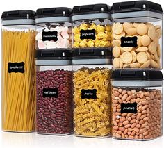 an assortment of different types of pasta and nuts in plastic containers with labels on them