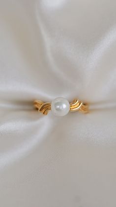 * Ring Material: Pearl, 18K Yellow Gold * Ring Dimensions: 15.5x6.5MM Top Design, 2.6MM Tapering Band * Size: 6.5 * Stone Weight & sizes: Pearl - 6.5MM * Overall weight: 3.5g Classic Gold Plated Pearl Ring For Wedding, Gold Pearl Ring With Polished Finish For Promise, Classic Yellow Gold Plated Pearl Ring, Gold Timeless Pearl Promise Ring, Timeless Gold Pearl Promise Ring, Elegant White Gold-plated Rings, Classic Gold Plated Pearl Ring For Anniversary, Elegant White Pearl Ring Gold Plated, Elegant Gold-plated Pearl Ring For Formal Occasions