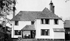 an old black and white photo of a house