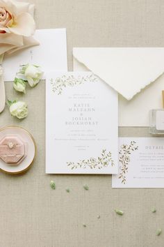 the wedding stationery is laid out and ready to be used