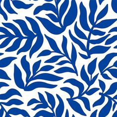 a blue and white pattern with leaves on it