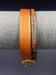 Pretty combination of shimmery tan leather and black multi paisley with an antique gold clasp to finish the look. A super fun piece that would be a beautiful addition to your fall wardrobe. Boho Chic Style, Cowgirl Chic, Chic Leather, Le Crochet, Western Leather, Leather Cuffs, Boho Chic Fashion, Fall Wardrobe, Tan Leather