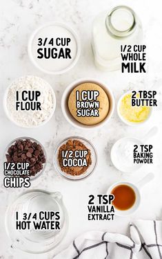 the ingredients to make chocolate chip cookies are shown in bowls on a marble countertop