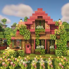 an image of a house in the middle of some flowers and trees with plants growing on it