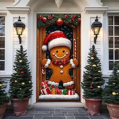 a door decorated with christmas decorations and gingerbread man