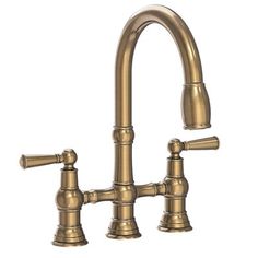 an antique style kitchen faucet with two handles