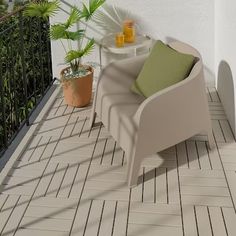 a chair and table on a tiled balcony