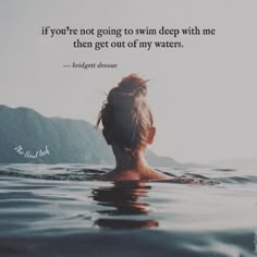 a woman swimming in the water with a quote above her that says, if you're not going to swim deep with me then get out of my waters