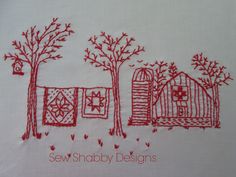 a red and white embroidery design with trees, barn and birdhouse on the side