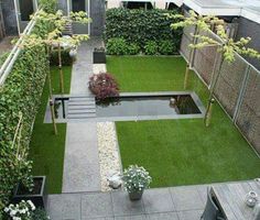 an aerial view of a garden with grass and flowers