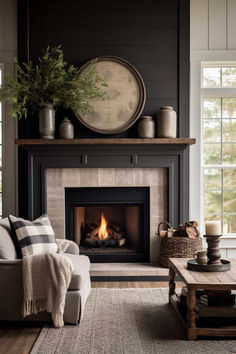 a living room filled with furniture and a fire place in the middle of the room