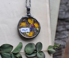 "Hidden Message, Secret Note, Message Necklace, Love Note, Bridesmaid Necklace, Terrarium Jewelry, Botanical Necklace, Pressed Flower pendant Delicate terrarium necklace by MARIAELA. Very romantic piece! It can be a perfect gift for beloved one. Hand-written note can be added to this necklace. Please choose maximum 5-word-long text :) One of a kind. A plants are locked in a glass forever. I adore picking and drying flowers. Flowers that are used in my jewlery are the ones I have picked on meadow Drying Flowers, Secret Notes, Dried Pressed Flowers, Boho Chic Bracelets, Message Necklace, Terrarium Jewelry, Terrarium Necklace, Hidden Messages, Hidden Message