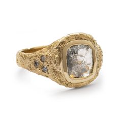 A signet-style ring, inspired by the Ether Ring, featuring a 1.10ct rose-cut diamond slice with dove-grey inclusions and a polished bezel with a textured finish. The piece is complemented by a sextet of Salt & Pepper Diamonds in triangular arrangements along the shoulders. Perfect for a proposal or as a unique right-hand ring, this piece also makes an exquisite pair with its counterpart, the Cassiopeia Pavé Ring. Engagement Ring For Men, Unconventional Bride, Pinky Signet Ring, Avant Garde Jewelry, Salt Pepper Diamond, Ring Inspo, Pepper Diamond, Right Hand Rings, Hand Ring