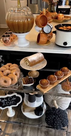 an assortment of baked goods on display at a bakery