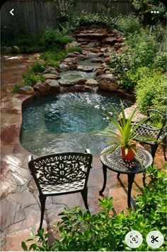 a small backyard with a pool and patio furniture