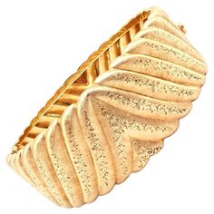 18k Yellow Gold Vintage Cuff Bracelet by Mario Buccellati. Details: Weight: 60.8 grams Length: Inner Circumference 6.5" Width: 21.5mm Stamped Hallmarks: M Buccellati 750 Italy *Free Shipping within the United States* YOUR PRICE: $20,500 3076enexd Buccellati Bracelet, Yellow Gold Cuff Bracelet, Italian Jewelry Designers, Vintage Cuff Bracelet, Gold Cuff Bracelet, Cuff Design, Wide Cuff Bracelets, Italian Jewelry, Gold Bracelet Cuff