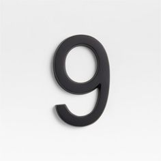 the number nine is black against a white background