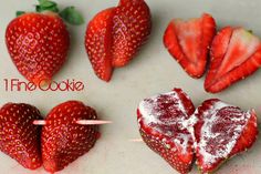 chocolate dipped strawberries are arranged in the shape of hearts on a baking sheet and placed on a cooling rack