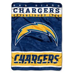 the northwest nfl blanket is shown in blue and yellow, with chargers on it's side