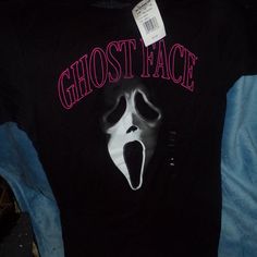 a black shirt with the words ghost face printed on it