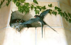 a painting of two birds on a tile floor next to a plant with green leaves