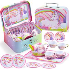 a unicorn themed lunch box with plates, cups and utensils