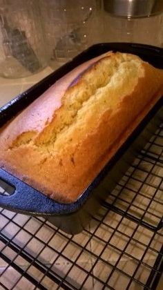 a loaf of bread sitting on top of a cooling rack