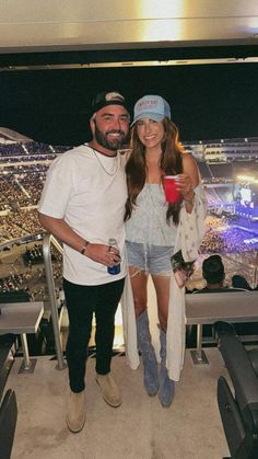 We wore these couples country concert outfit to the Luke Combs concert & they were so perfect!  Save these country concert outfit ideas & get Bryce's country concert outfit mens & my jean shorts & cowboy boots outfit here! Shorts And Cowboy Boots Outfit, Shorts Cowboy Boots, Luke Combs Concert, Concert Outfit Men, Shorts And Cowboy Boots