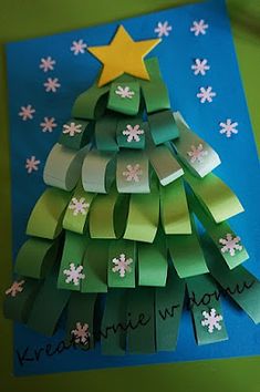 a christmas tree made out of green paper