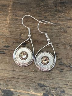 You are looking at a pair of 45 auto bullet earrings with an silver shade colored Swarovski crystal in the center. 45 Caliber, Bullet Earrings, Western Bedroom Decor, Western Bedroom, Tear Drop, Swarovski Crystal, Jewelry Ideas, Swarovski Crystals, Crochet Earrings