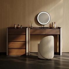 a white chair sitting in front of a wooden desk with a mirror on top of it